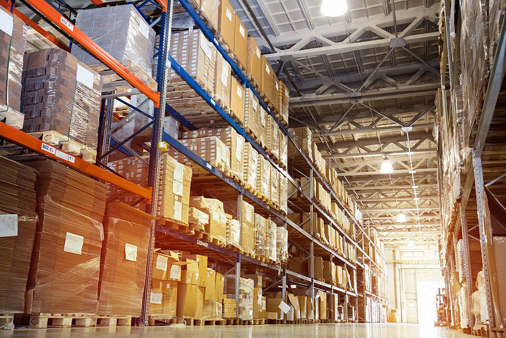 A warehouse full of pallets of boxes.