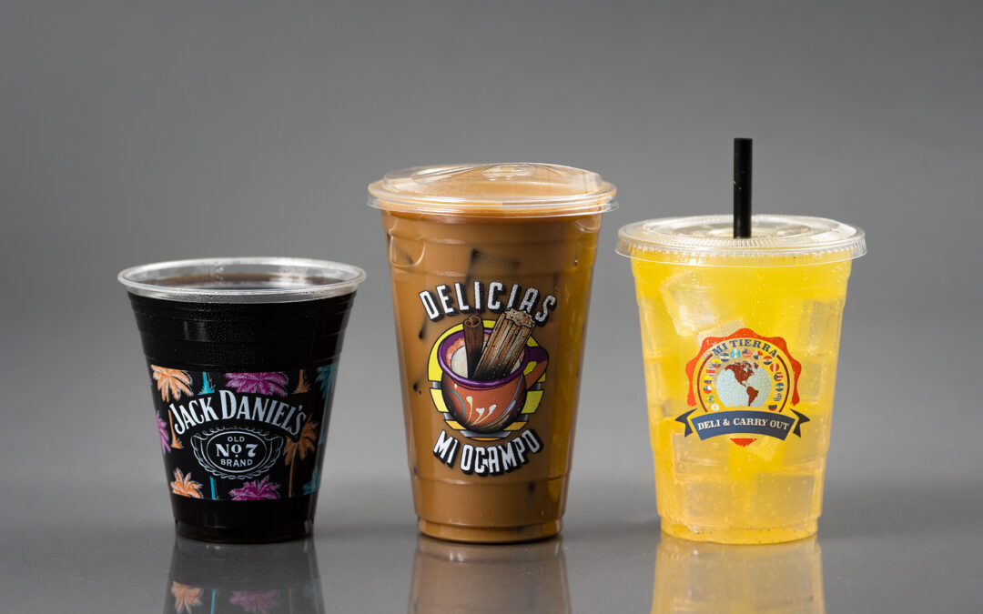 Three plastic cups with custom printed logos